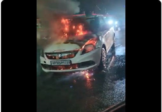 Lucknow News : समतामूलक चौराहे पर कार बनी आग का गोला, मचा हडकंप, देखें वायरल वीडियो