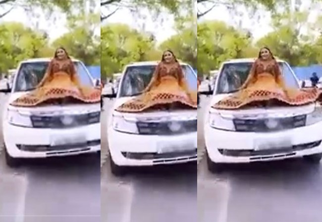 Video: कार के बोनट पर बैठ कर दुल्हन को रील बनाना पड़ा महंगा, कट गया इतने का चालान